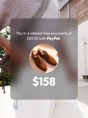 Photo of a person outside putting a smartphone in their pocket with a graphic of a payment plan for a pair of $158 dress shoes